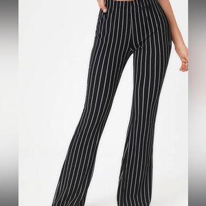 Loose fitting pinstripe pants. High wasted